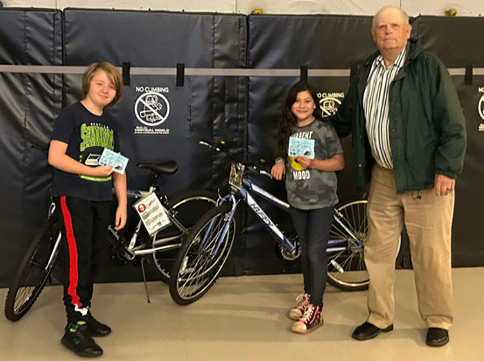 Pictured with WM Russ Sutton are bike winners from one of the Elementary Schools that participated in the Bikes-For-Books program.