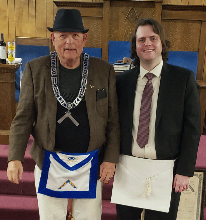 Brother Yeshua Hall with WM Russ Sutton, who conferred the Fellowcraft Mason Degree.