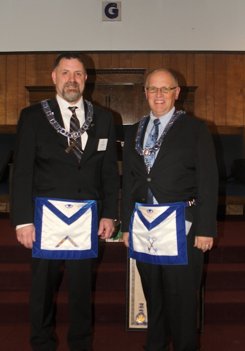 Worshipful Master Dan White awarding WB Scott Thompson with the Trowel Lapel Pin for Scott's outstanding contributions to Phoenix Lodge.