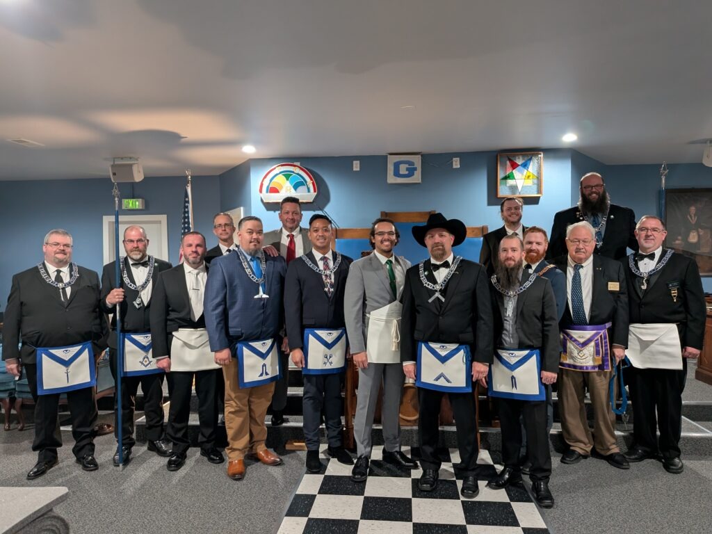 Bro. Cameron Lewis with all the brothers who partook in his EA degree.